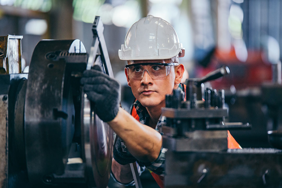 Fabricators working in shop